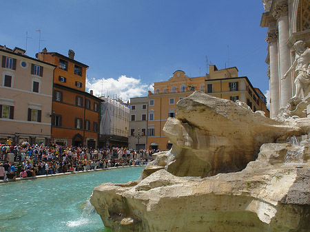 Foto Menschen am Brunnen